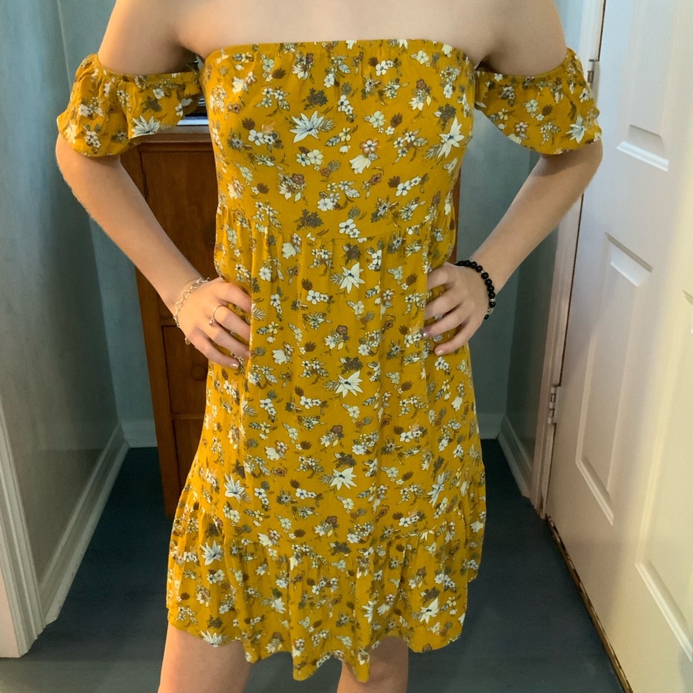 Off the shoulder yellow floral dress.